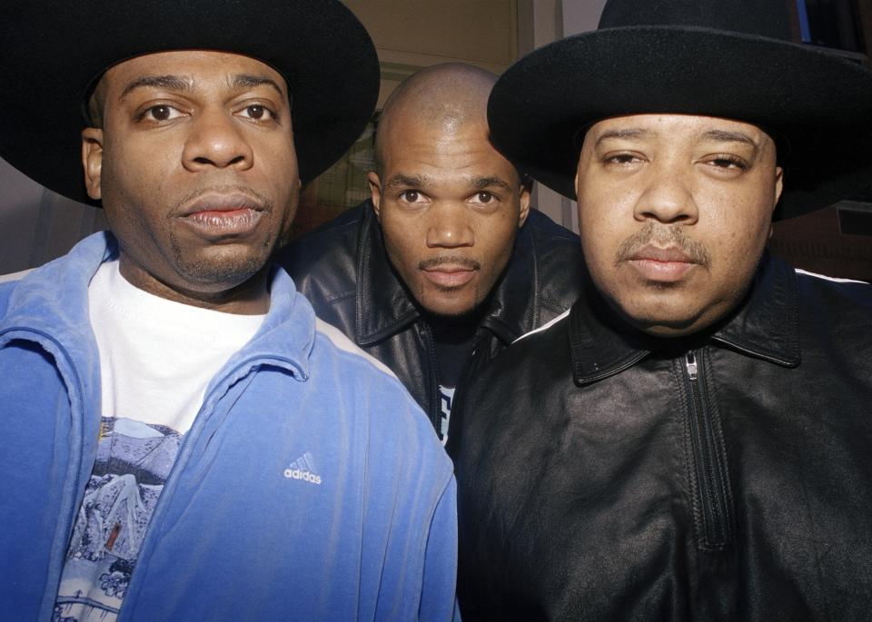 FILE - Rap trio Run-DMC poses in New York, April 5, 2001. From left: Jam Master Jay (Jason Mizell), DMC (Darryl McDaniels) and DJ Run (Joseph Simmons). Opening statements are set for Monday in the federal murder trial of Karl Jordan Jr. and Ronald Washington, who were arrested in 2020 for the murder of Jam Master Jay. (AP Photo/Jim Cooper, File)