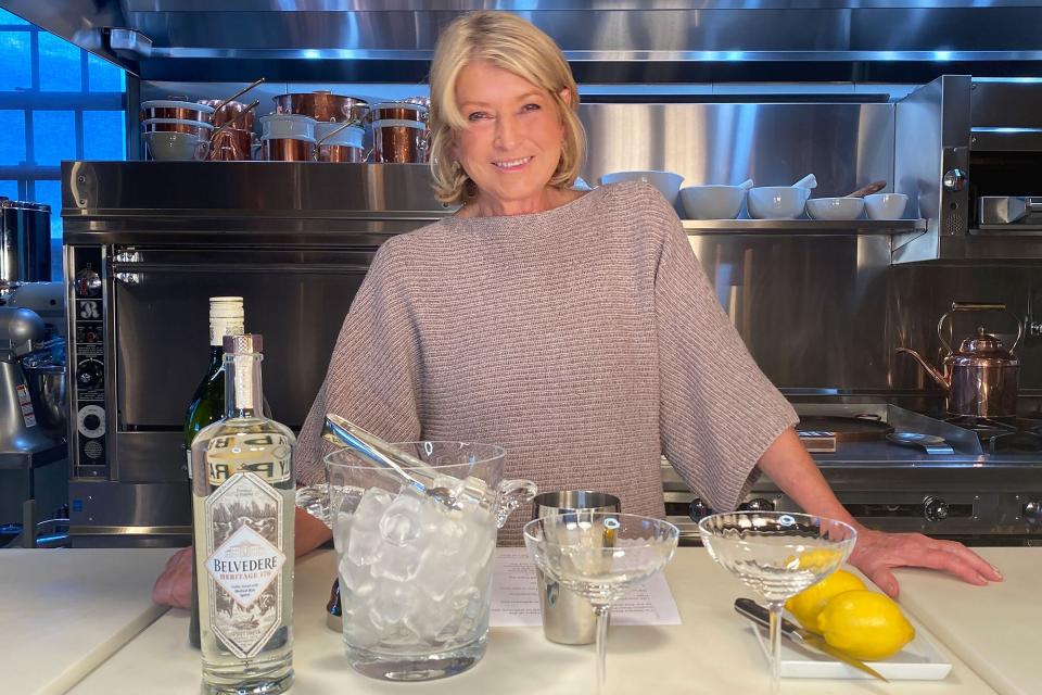 Martha Stewart stands before cocktail ingredients