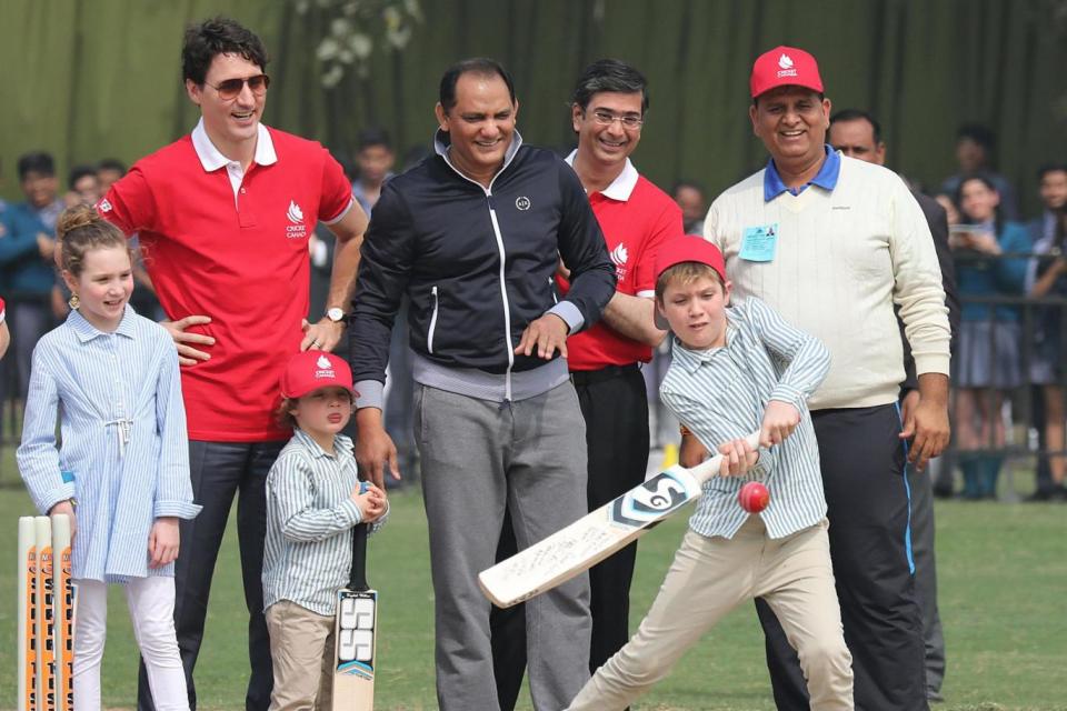 Visit: On Thursday the Trudeaus took part in a game of cricket (EPA)