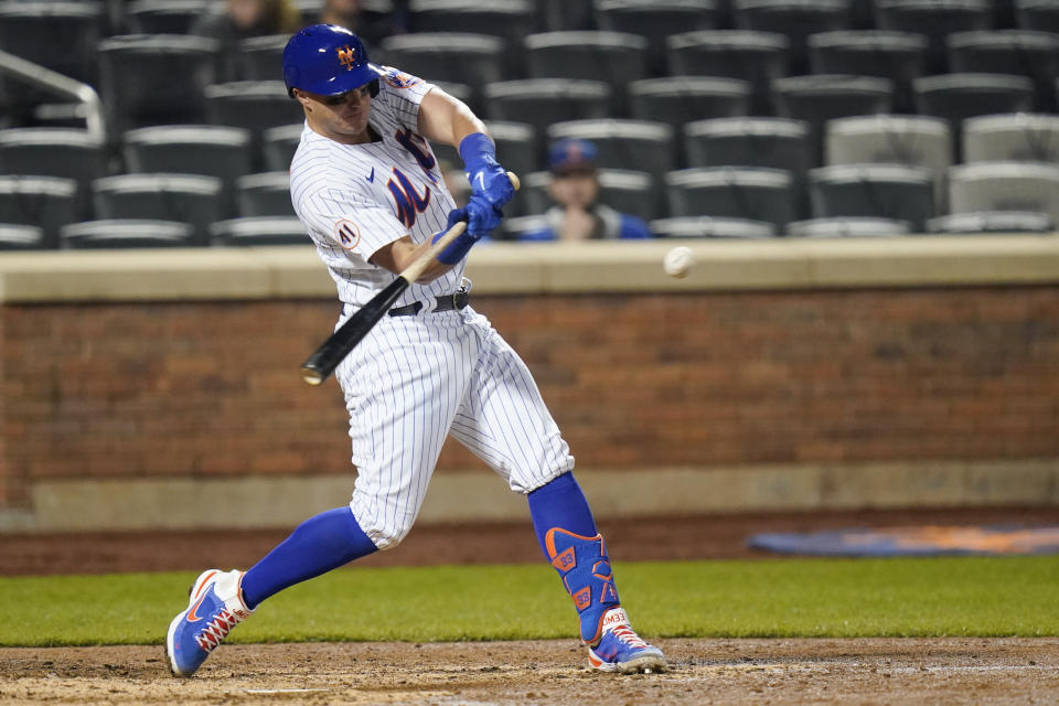 New York Mets' James McCann hits a two-run home run during the eighth inning of a baseball game against the Philadelphia Phillies Wednesday, April 14, 2021, in New York. (AP Photo/Frank Franklin II)