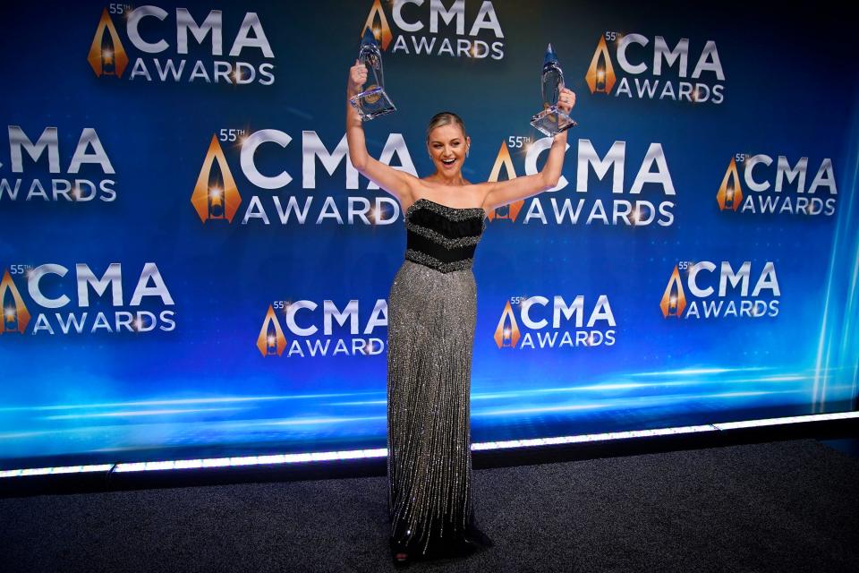 Kelsea Ballerini poses with her awards during the 55th CMA Awards at Bridgestone Arena Wednesday, Nov. 10, 2021 in Nashville, Tenn.