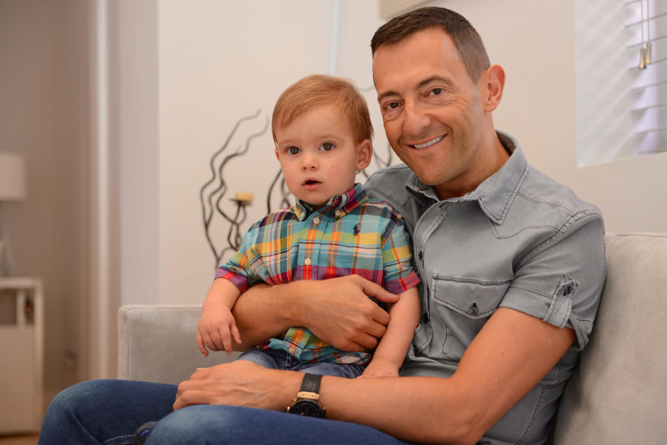 This July 2013 photo provided by the family shows Simon Taylor and his son, Cal. The 50-year-old Briton had a son via a surrogate birth in Arkansas in 2012, and is now working on arrangements to have a second child. Taylor, a self-employed businessman, describes himself as an admirer of America who never would have considered any other venue for the process. In an email, Taylor said he had extensive discussions with family and friends about his decision, with the upshot being strong support once those close to him realized how serious he was. (AP Photo/Simon Taylor)