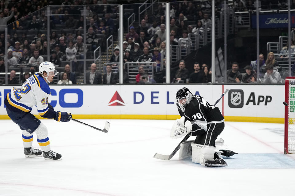 St. Louis Blues right wing Kasperi Kapanen, left, scores on Los Angeles Kings goaltender Joonas Korpisalo during the third period of an NHL hockey game Saturday, March 4, 2023, in Los Angeles. (AP Photo/Mark J. Terrill)