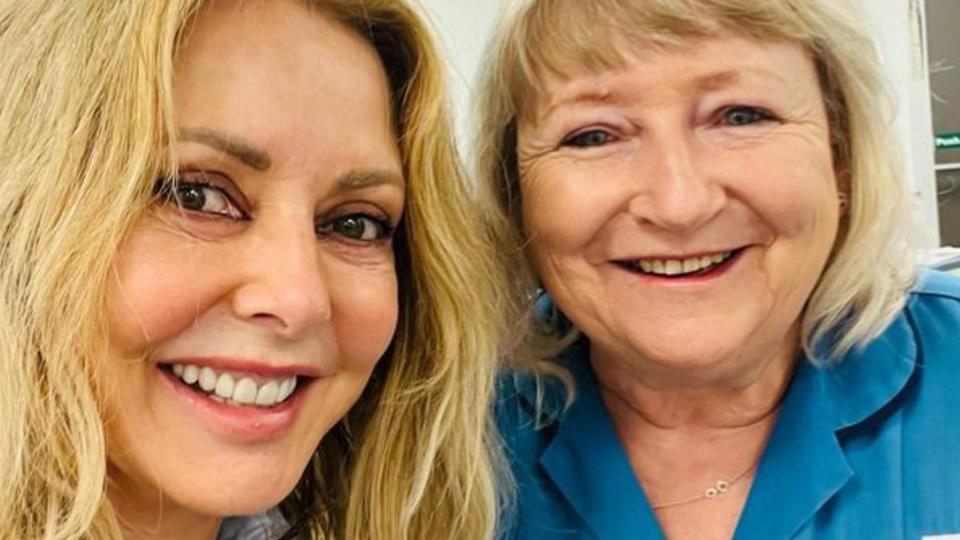 Carol Vorderman with a blood donation nurse