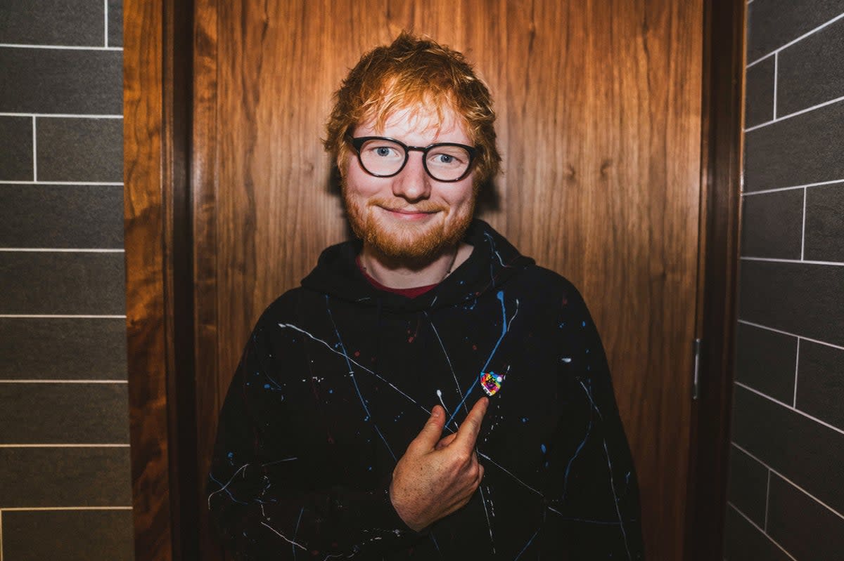 Ed Sheeran wearing a multi-coloured version of the Blue Peter badge that he designed for BBC Music Day. (BBC)