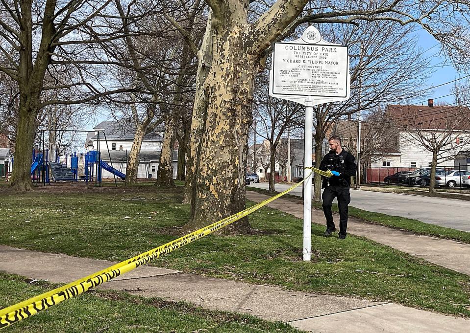 An Erie police cordons off Columbus Park, at West 16th and Poplar streets, after a shooting shortly before 3:50 p.m. on Monday. Police searched the park for shell casings.