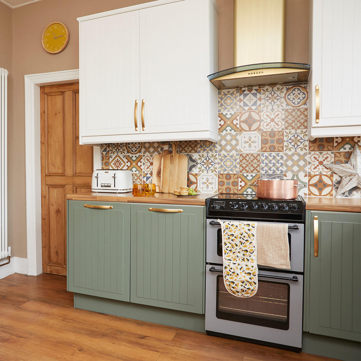  Kitchen with green painted cabinets. 