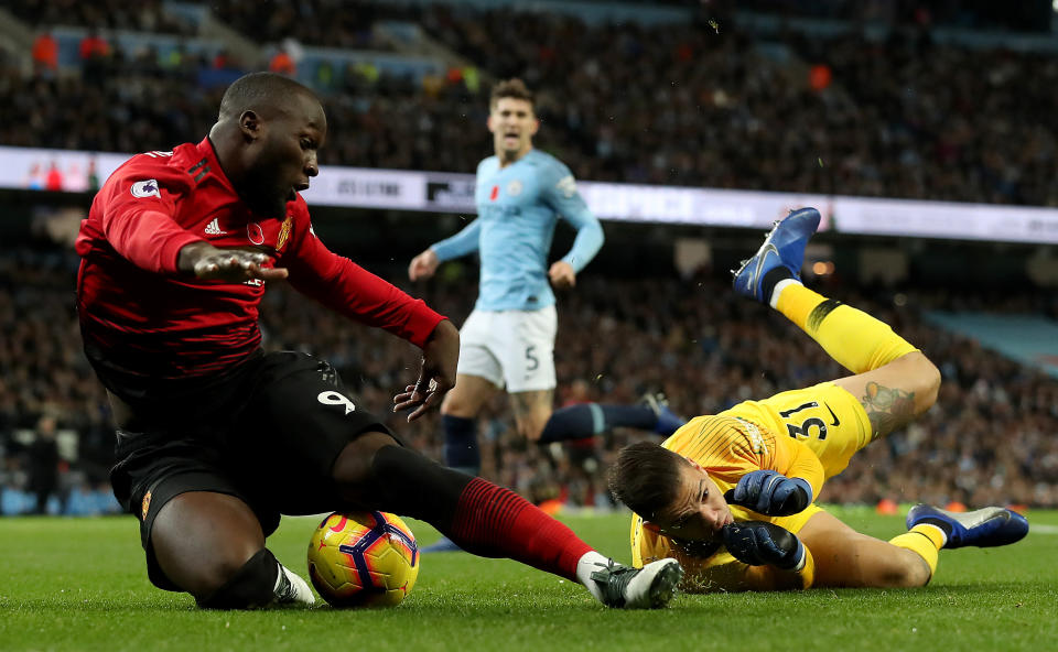 Manchester United’s Romelu Lukaku is fouled by Manchester City goalkeeper Ederson which resulted in a penalty