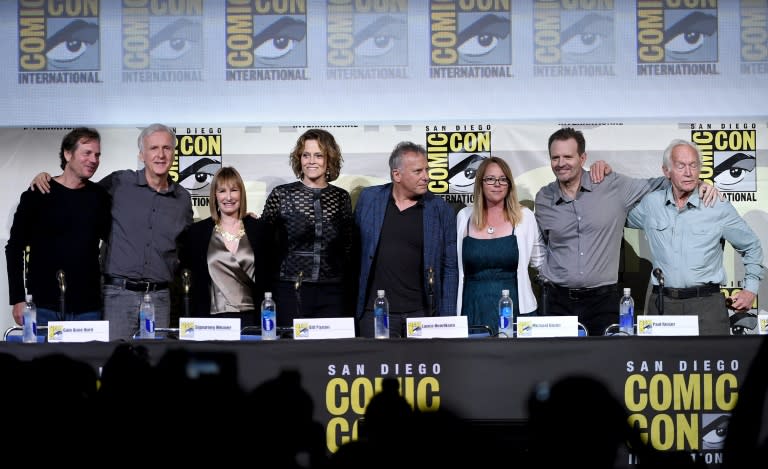 (L-R) Bill Paxton, James Cameron, Gale Anne Hurd, Sigourney Weaver, Paul Reiser, Carrie Henn, Michael Biehn, and Lance Henriksen attend the "Aliens: 30th Anniversary" panel during Comic-Con International 2016