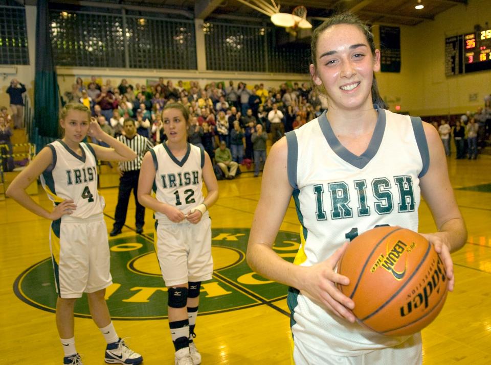 Kady Schrann of York Catholic was given Friday night's game ball for scoring her 2,000th point against Biglerville on February 4, 2011.