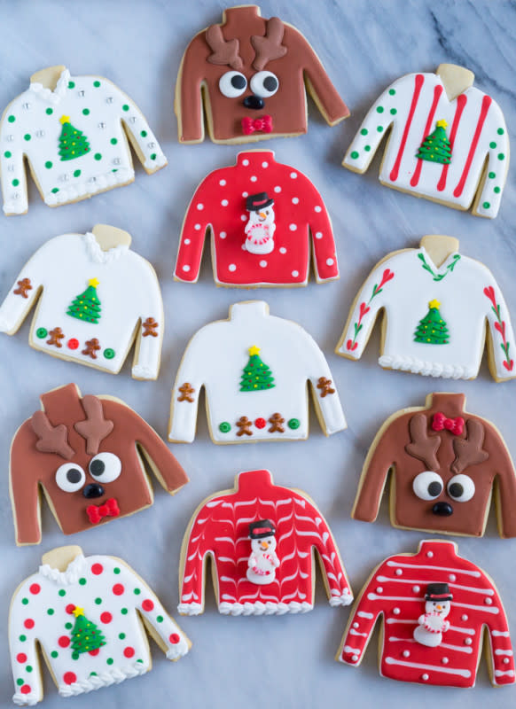 <p>Bake at 350</p><p>You'd be remiss not to take these to your next ugly sweater party.</p><p><strong>Get the recipe: <a href="https://www.bakeat350.net/2016/12/easy-ugly-christmas-sweater-cookies.html" rel="nofollow noopener" target="_blank" data-ylk="slk:Ugly Christmas Sweater Cookies;elm:context_link;itc:0;sec:content-canvas" class="link rapid-noclick-resp">Ugly Christmas Sweater Cookies</a></strong></p>