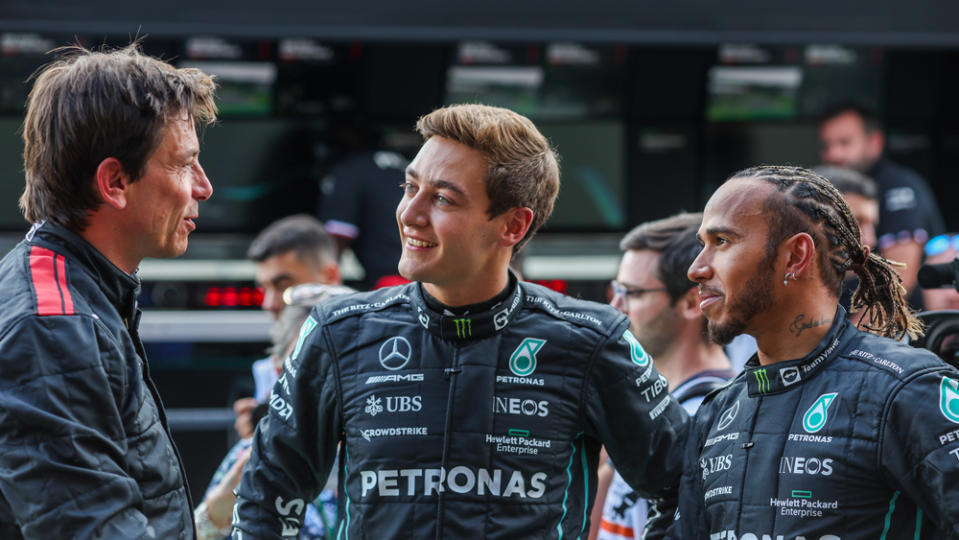 Mercedes-AMG Petronas team principal Toto Wolff with George Russell and Lewis Hamilton during a preview of the 2022 Belgian Grand Prix.