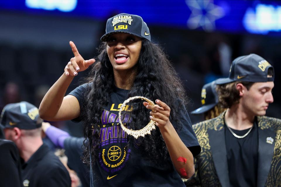 LSU star forward Angel Reese celebrates after the Tigers beat Iowa for the NCAA women's basketball championship at the American Airlines Center in Dallas on April 2, 2023.