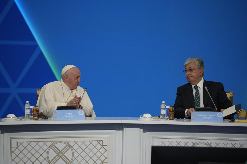 Kazakhstan's President Kassym-Jomart Tokayev, right, and Pope Francis attend the '7th Congress of Leaders of World and Traditional Religions, in Nur-Sultan, Kazakhstan, Wednesday, Sep. 14, 2022. Pope Francis is on the second day of his three-day trip to Kazakhstan. (AP Photo/Alexander Zemlianichenko)