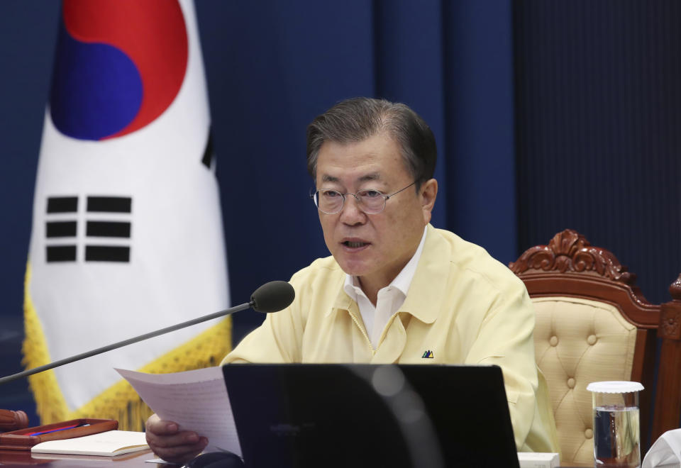 South Korean President Moon jae-in speaks during a Cabinet meeting at the presidential Blue House in Seoul, South Korea, Tuesday, Sept. 28, 2021. After the North Korea's launch Tuesday, Moon ordered officials to examine its latest weapons firing and previous outreach in a comprehensive manner before formulating countermeasures, according to Moon's office. (Choe Jae-koo /Yonhap via AP)