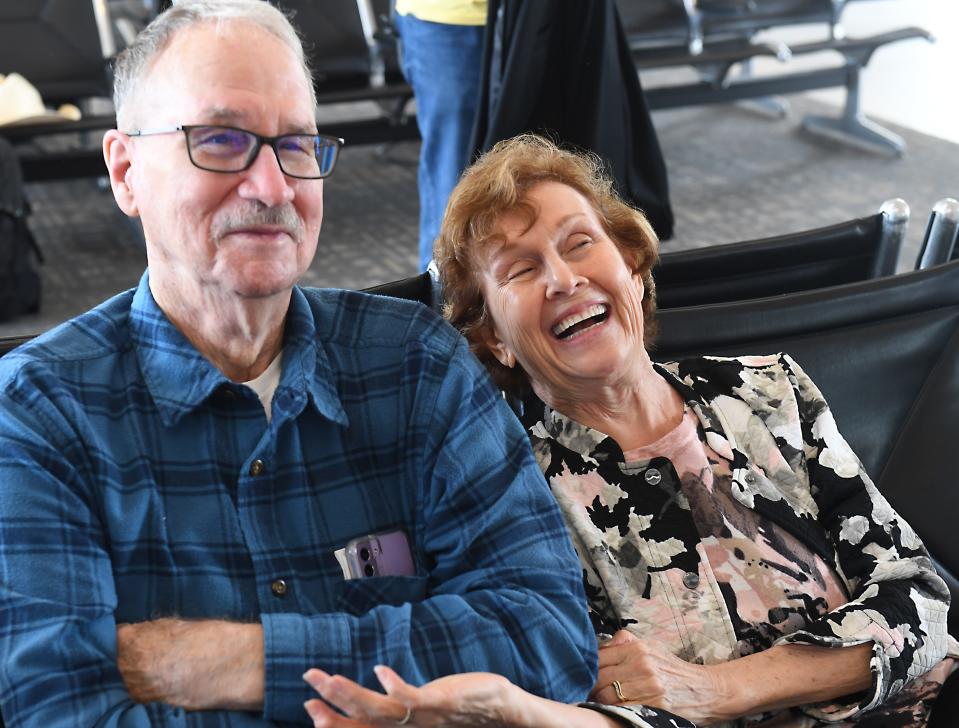 Breeze Airways made its Greenville-Spartanburg International Airport (GSP) based Inaugural Flight at the airport on May 3, 2024. Douglas Heimann and his wife Milicent Kari prepare for their flight to Providence. Milicent Kari, right, said when she heard of the airline, 'It gonna be a breeze to fly with Breeze Airways' as she talked about the flight experience.