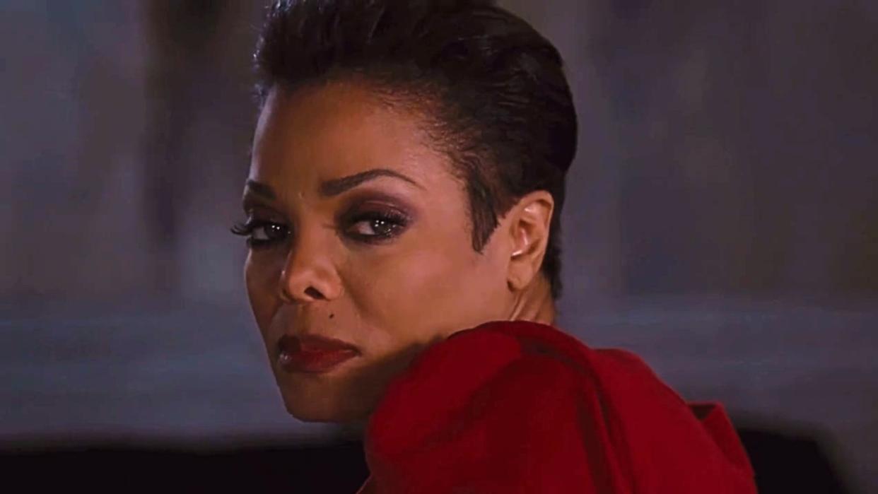  Jo Bradmore "Lady in Red" (Janet Jackson) in For Colored Girls. 