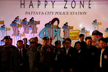 Policemen stand during the launch of the "Happy Zone" program aiming to improve the image of a city in Pattaya, Thailand March 25, 2017. REUTERS/Jorge Silva