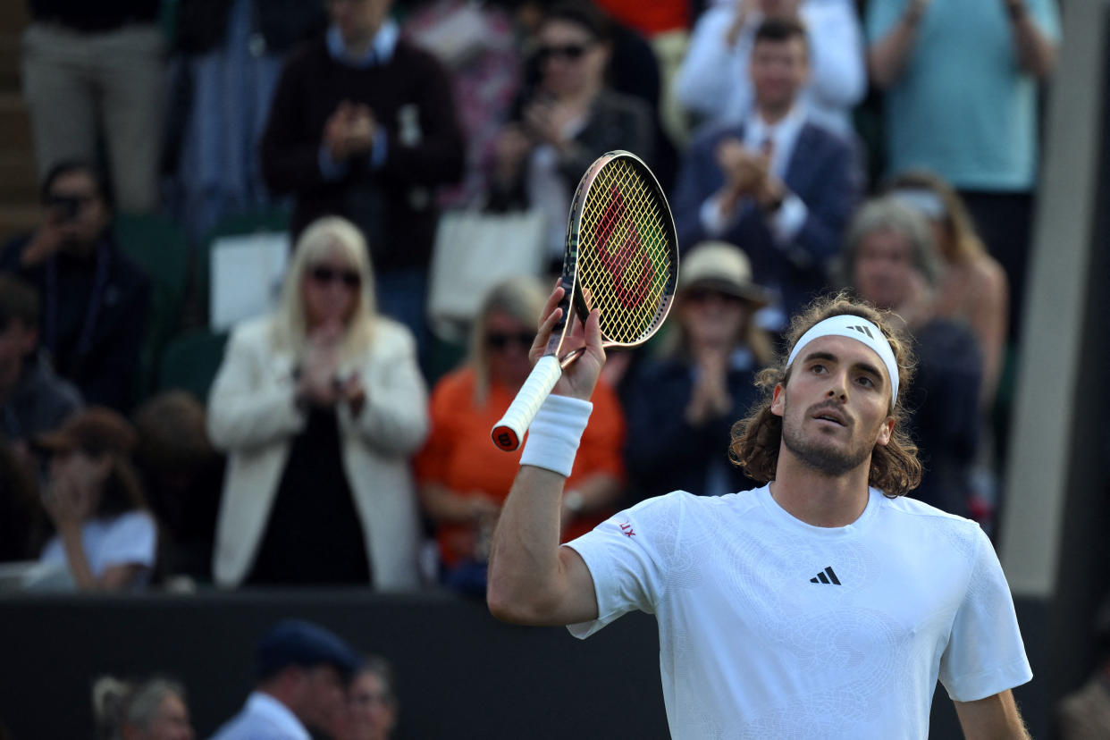 Stefanos Tsitsipas celebrates after a grueling five-set win over Dominic Thiem. (Photo by Daniel LEAL / AFP)