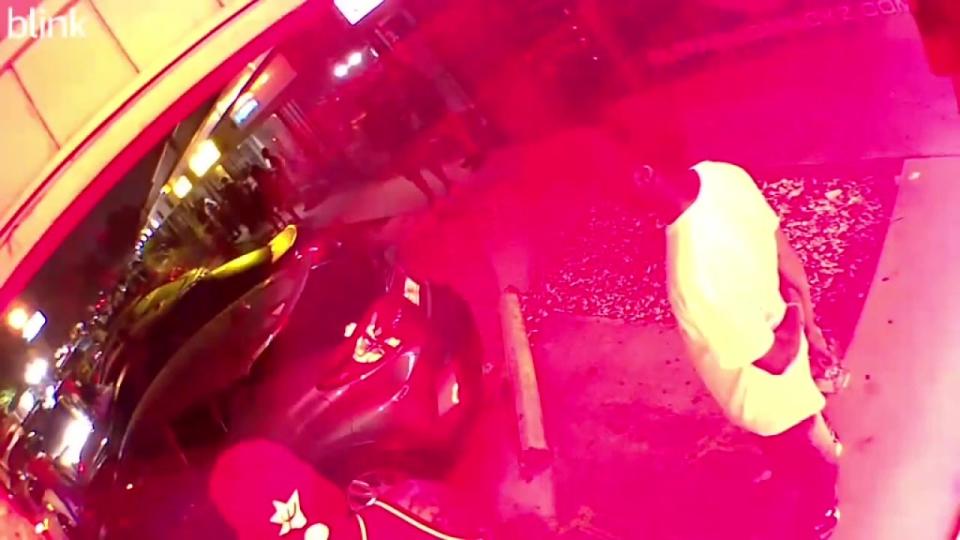 <div>Surveillance video shows moments shots rang out outside Sarasota hookah lounge.</div>