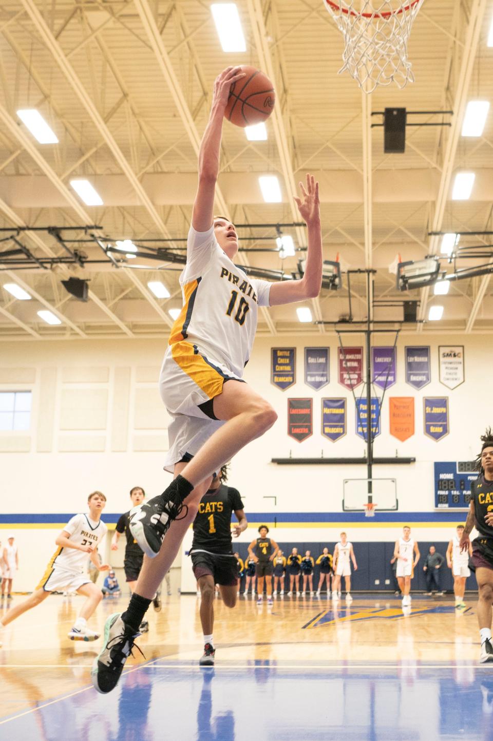 Pewamo-Westphalia freshman Grady Eklund takes a shot against Brandywine during the state quarterfinal game at Portage Central High School on Tuesday, March 21, 2023.