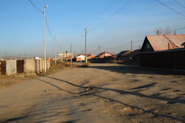 An unpaved road in one of Ulaanbaatar's western ger districts, unplanned neighborhoods where nomads fleeing hardship in the countryside come and set up camp.