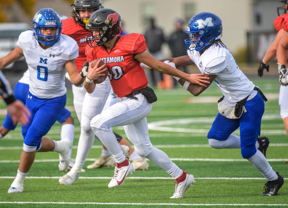 Metamora's Nick Rhoades runs against Decatur MacArthur in the second half of their Class 5A first-round state football playoff game Saturday, Oct. 28, 2023 in Metamora.