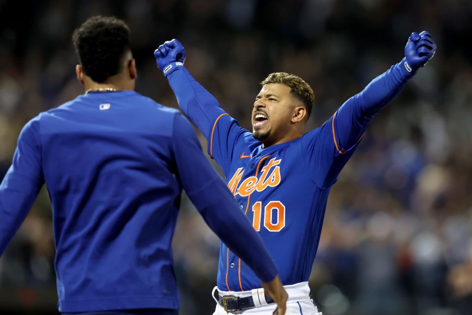 Eduardo Escobar celebrates his walk-off single on Wednesday.