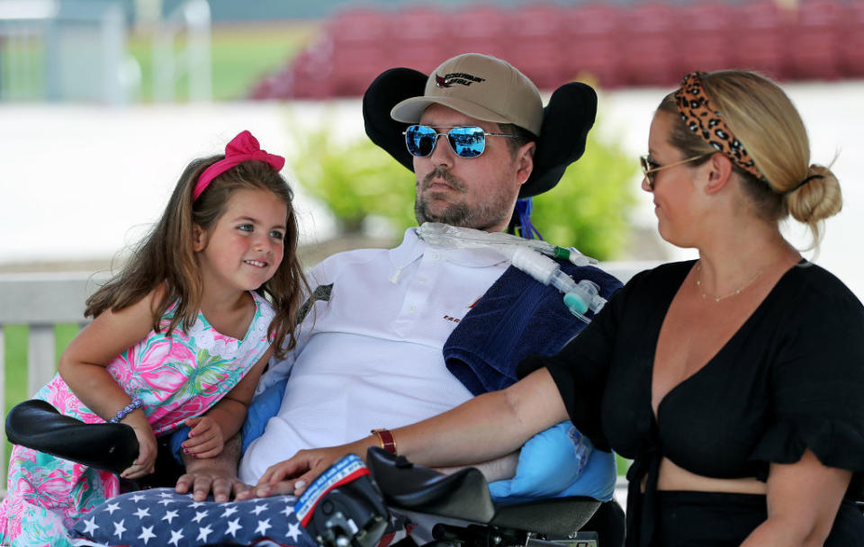 Pete Frates with his 4-year-old daughter Lucy and wife Julie by his side. 