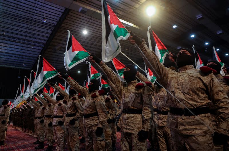 Hezbollah members parade during a rally marking al-Quds Day in Beirut's southern suburbs