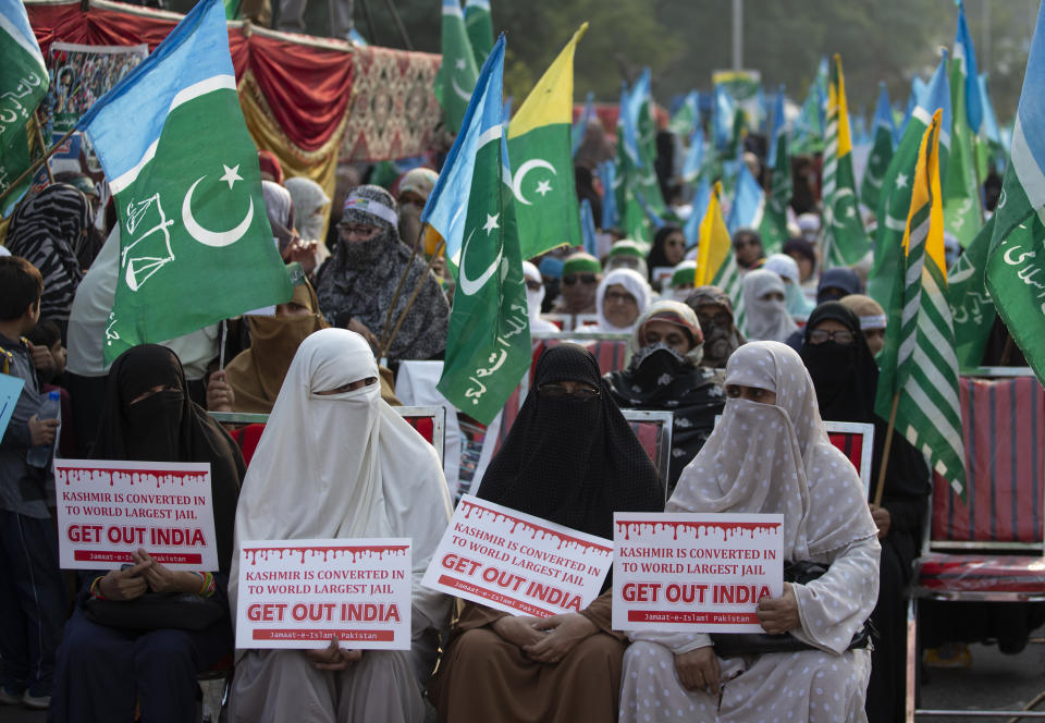 Supporters of Pakistani religious party Jamaat-e-Islami rally to express solidarity with Indian Kashmiris, in Islamabad, Pakistan, Wednesday, Oct. 16, 2019. Pakistani and Indian troops traded fire in the disputed Himalayan region of Kashmir on Wednesday, killing four civilians and wounding nearly a dozen others, officials from both sides said, as tensions remain high between the two South Asian countries. (AP Photo/B.K. Bangash)