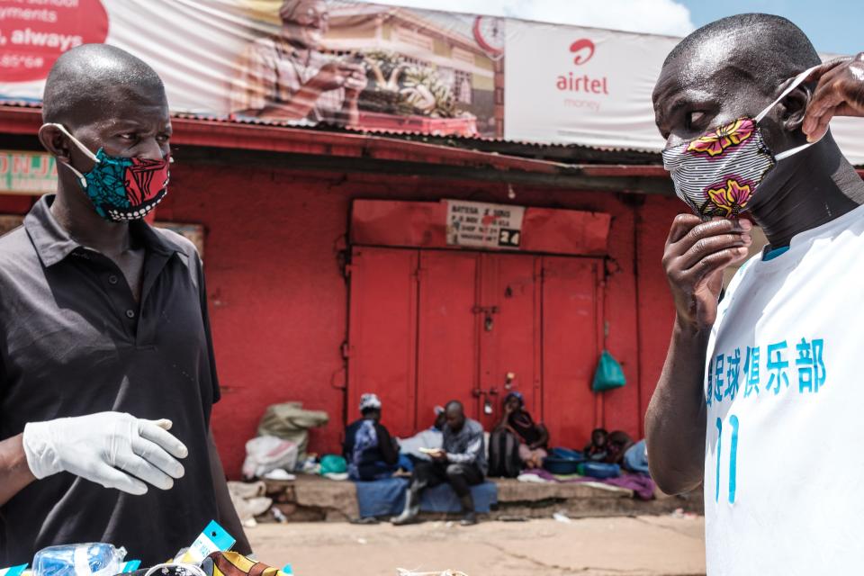 Vendor selling home-made masks in Kampala (AFP via Getty Images)