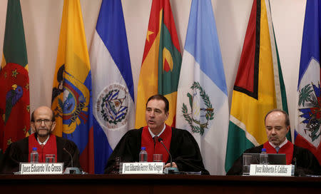 REFILE - CORRECTING TO INTER-AMERICAN COURT OF HUMAN RIGHTS Eduardo Vio Grossi, Eduardo Ferrer and Roberto Caldas, judges on the Inter-American Court of Human Rights, attend a hearing regarding the pardon of the former Peruvian president Alberto Fujimori, in San Jose, Costa Rica, February 2, 2018. REUTERS/Juan Carlos Ulate