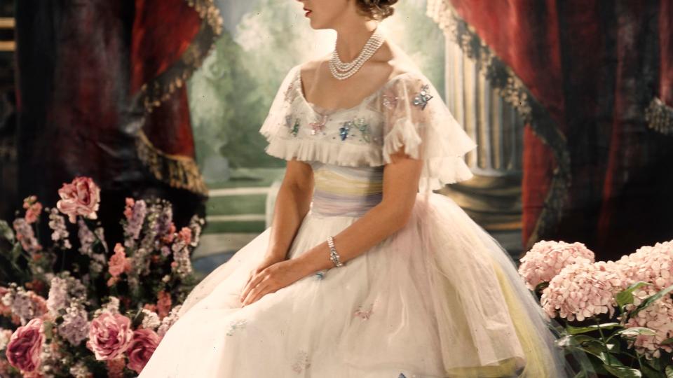 A Cecil Beaton portrait of Margaret on her 19th birthday reflects the romantic image of the royals at the time, with the Princess in a tulle gown decorated with butterflies