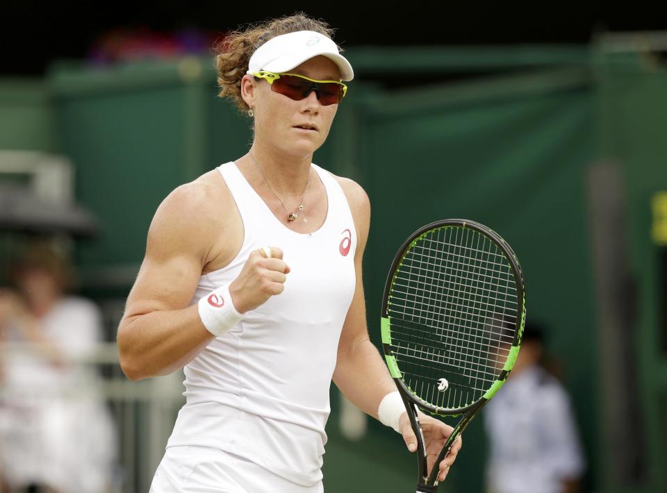 Samantha Stosur of Australia reacts during her match against Urszula Radwanska of Poland at the Wimbledon Tennis Championships in London, July 1, 2015. REUTERS/Henry Browne