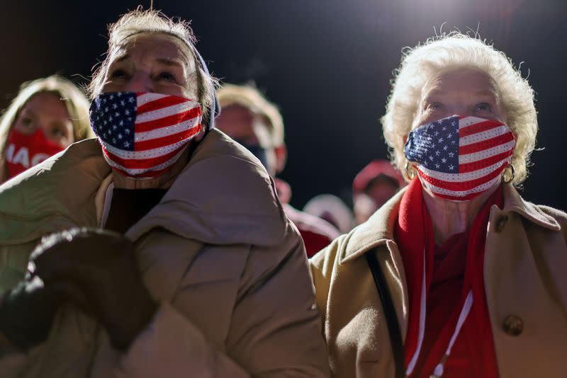 People attend a campaign event by U.S. President Donald Trump in Omaha, Nebraska