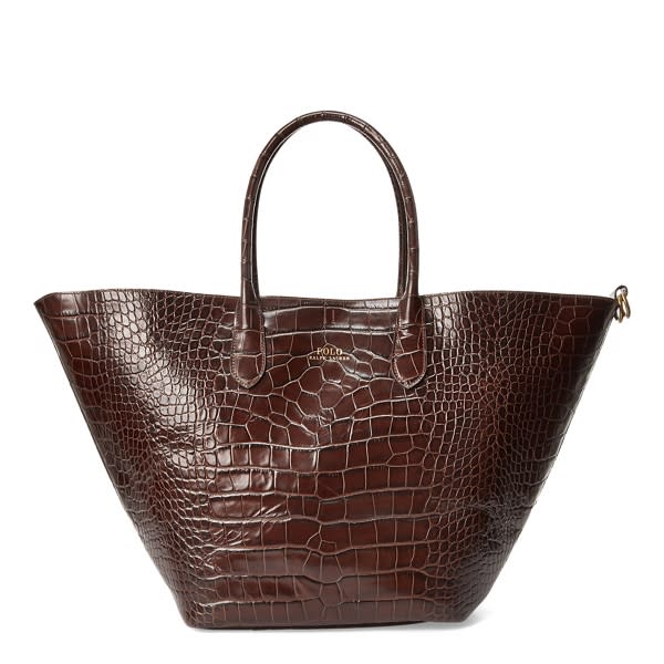 <p><a href="https://go.redirectingat.com?id=74968X1596630&url=https%3A%2F%2Fwww.ralphlauren.com%2Fwomen-accessories-handbags%2Fembossed-large-bellport-tote%2F498541.html&sref=https%3A%2F%2Fwww.townandcountrymag.com%2Fstyle%2Ffashion-trends%2Fg44576497%2Fbest-oversized-tote-bags%2F" rel="nofollow noopener" target="_blank" data-ylk="slk:Shop Now;elm:context_link;itc:0;sec:content-canvas" class="link rapid-noclick-resp">Shop Now</a></p><p>Embossed Large Bellport Tote</p><p>$748.00</p><p>ralphlauren.com</p>