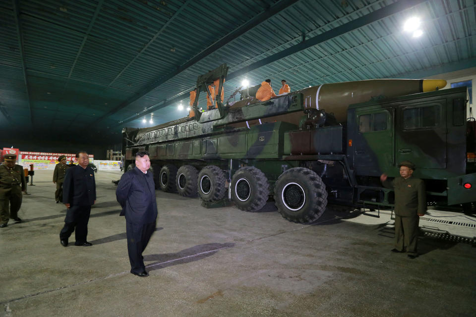 <p>North Korean leader Kim Jong Un inspects the intercontinental ballistic missile Hwasong-14 in this undated photo released by North Korea’s Korean Central News Agency (KCNA) in Pyongyang July 5, 2017. (Photo: KCNA/via Reuters) </p>