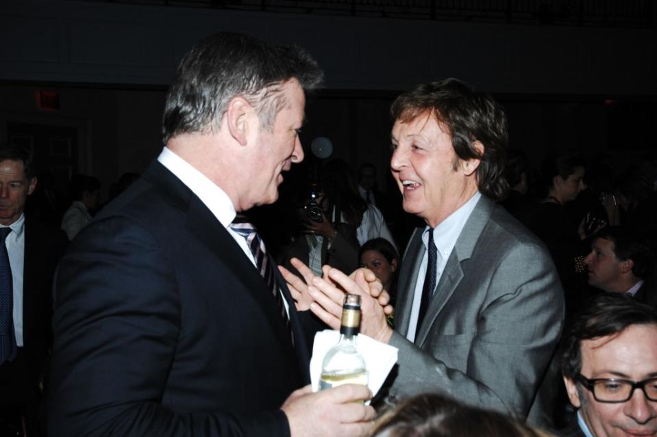Alec Baldwin and Paul McCartney catch up while attending the Stella McCartney Womenswear Fall/Winter 2024-2025 show. Patrick McMullan via Getty Images