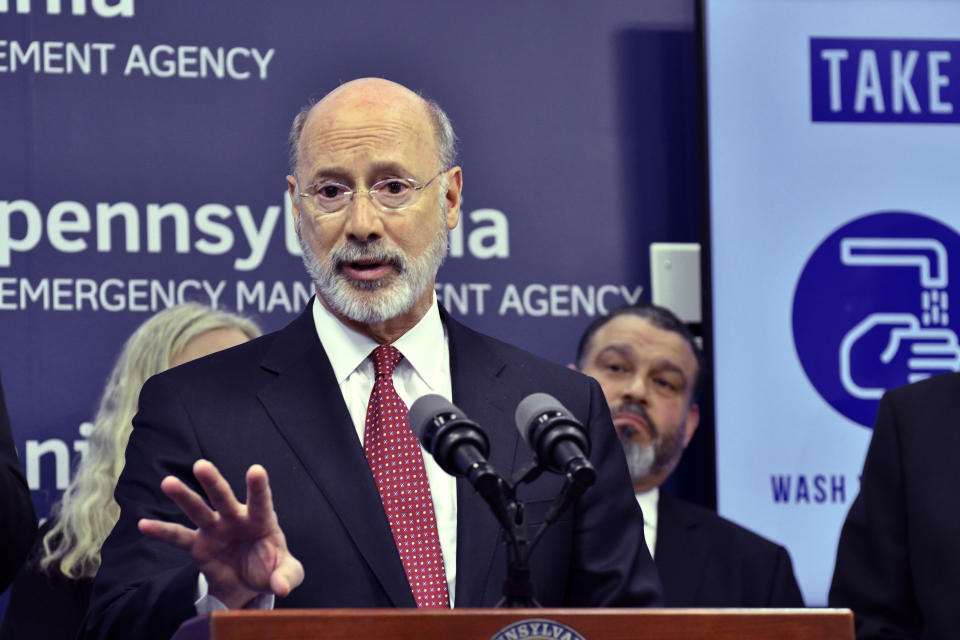 FILE - In this March 12, 2020, file photo, Gov. Tom Wolf of Pennsylvania speaks at a news conference at Pennsylvania Emergency Management Headquarters in Harrisburg, Pa. Wolf is struggling to fight against a Republican revolt over his stay-at-home orders and business shutdowns. Egged on by state GOP lawmakers, counties have threatened to defy his orders while at least a few business owners have reopened their doors despite his warnings. (AP Photo/Marc Levy, File)