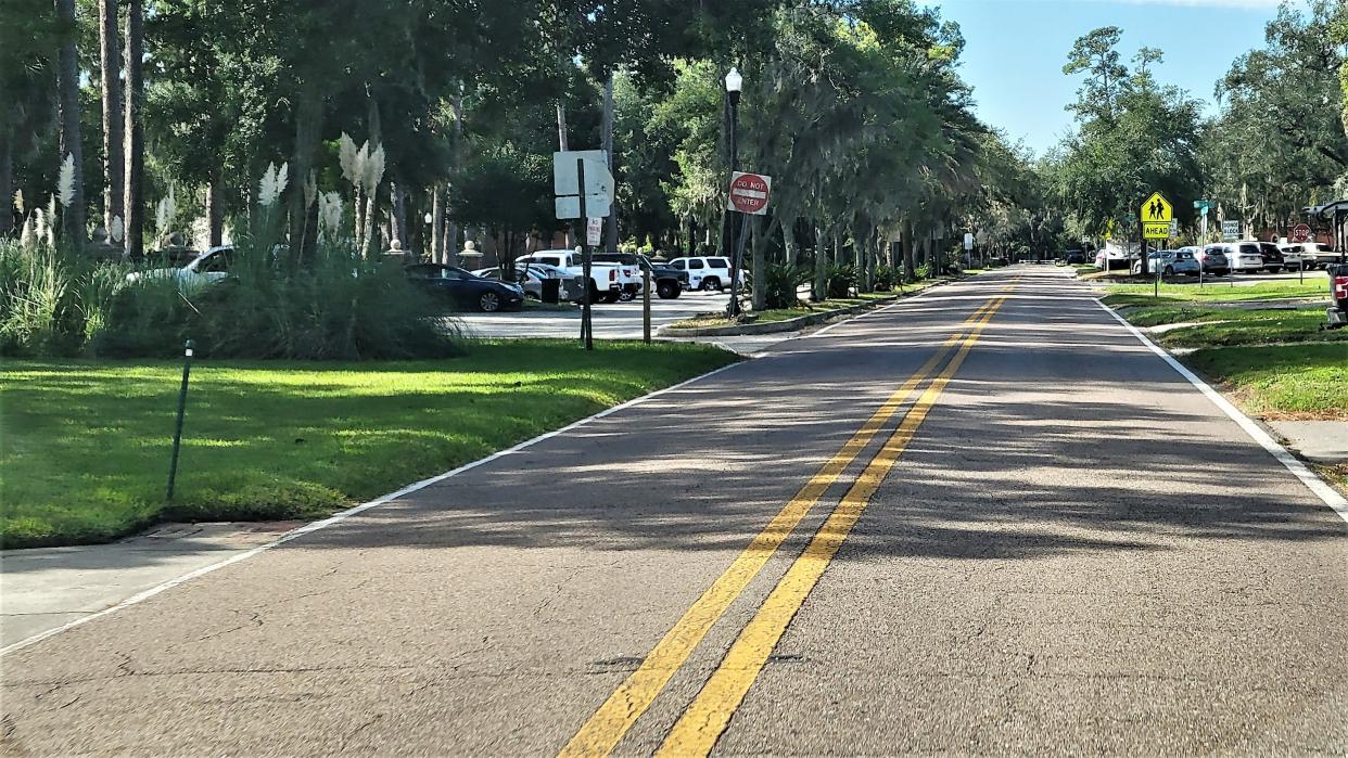 Cracks and bumps are evident in this stretch of the 4000 block of Ortega Boulevard near Stockton Park (left), the subject of a reader complaint to the FDOT.