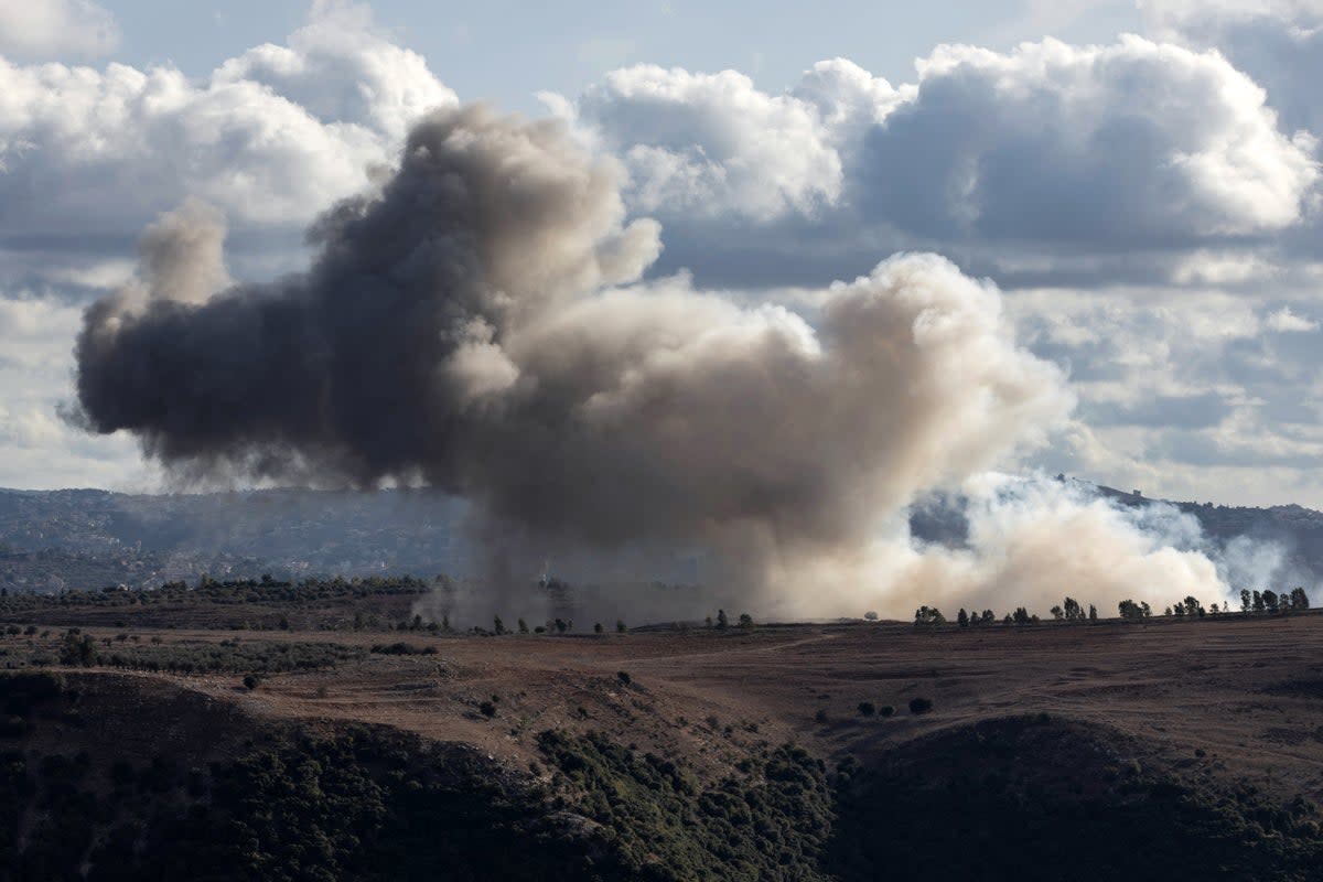 Smoke billows from the site of an Israeli strike on the Lebanon border  (AFP/Getty)