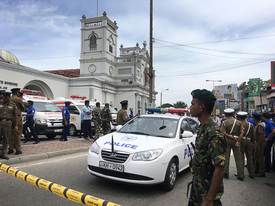 Sri Lankan Army soldiers secure the area around a church after a blast in Colombo, Sri Lanka, on Sunday. Witnesses are reporting explosions hit three churches in Sri Lanka on Easter Sunday, causing casualties among worshippers. Source: AAP