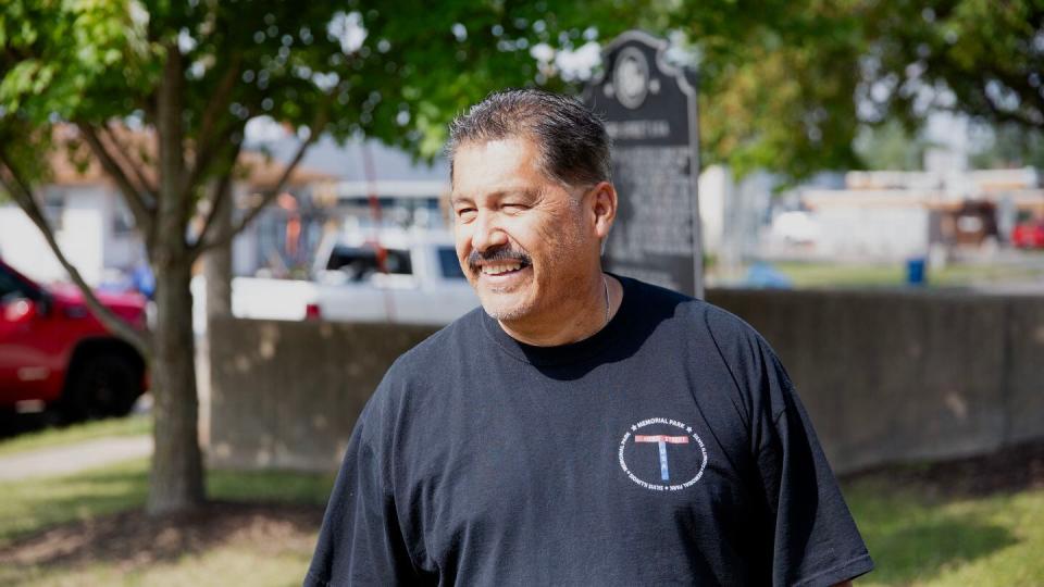 Ald. Bob Cervantes walks around Hero Street Memorial Park a month after winning an election to represent the neighborhood on the Silvis city council. (Zamone Perez/Staff)