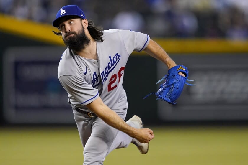 Los Angeles Dodgers starting pitcher Tony Gonsolin throws against the Arizona Diamondbacks.