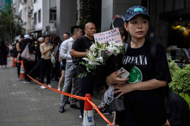 <p>Getty Images</p> Fans line up outside the funeral home on July 31, 2023