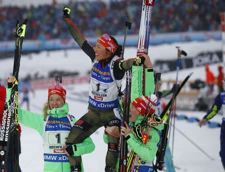 Biathlon - IBU World Championships - Women's 4 x 6km relay - Hochfilzen, Austria - 17/2/17 - Laura Dahlmeier, Franziska Hildebrand and Maren Hammerschmidt of Germany react. REUTERS/Leonhard Foeger