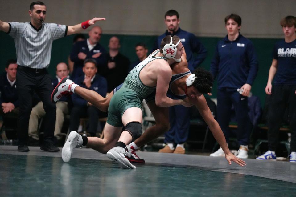 Blair Academy wrestling at Delbarton on Friday, February 2, 2023. Simon Ruiz (Delbarton) on his way to defeating Lorenzo Norman (Blair) in their 175-pound match.