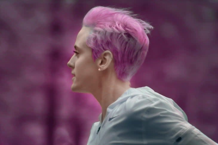 <span class="article__caption">Brightly colored hair has become one of DeBues-Stafford's calling cards--and a way to express herself on the track.</span>