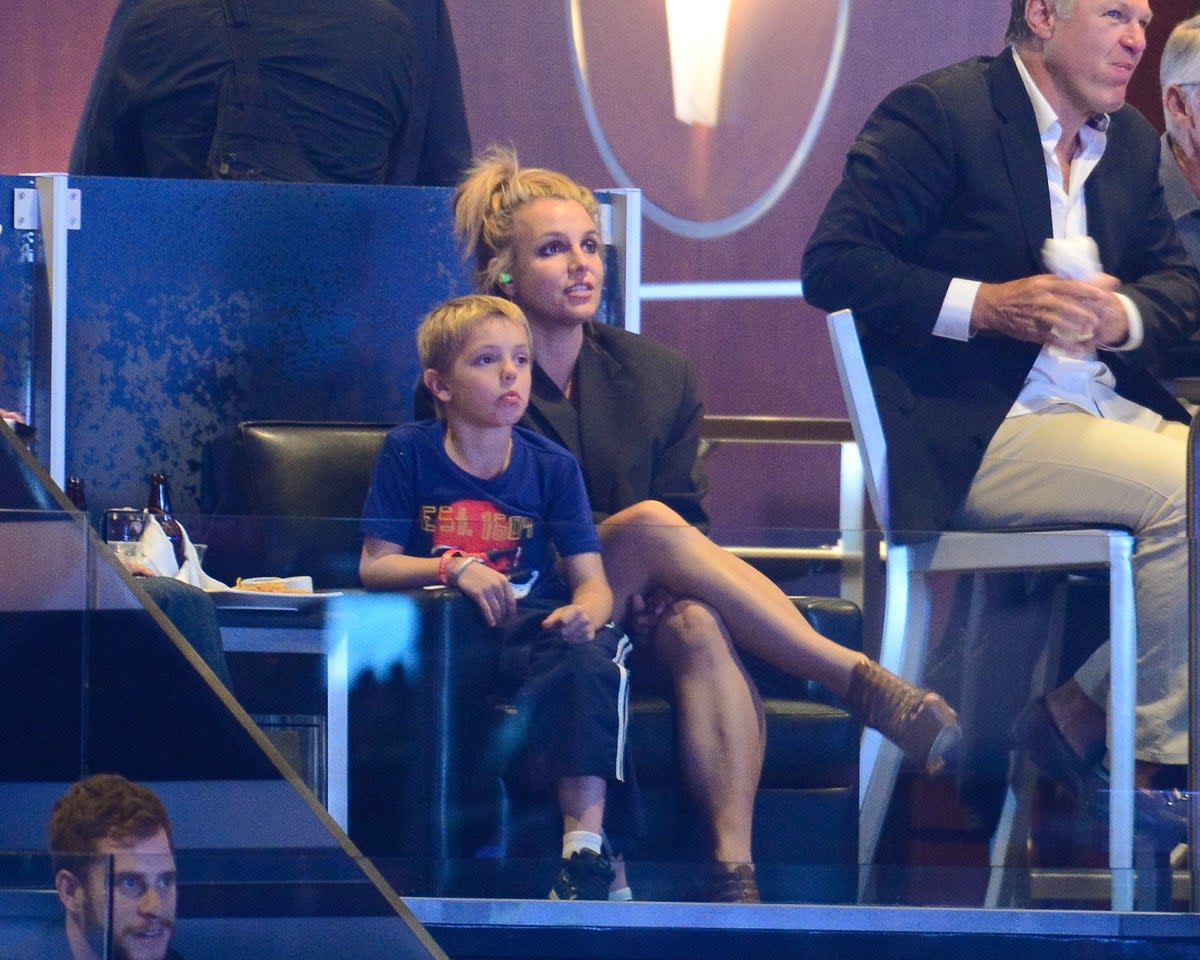 Britney Spears and her son Jayden James Federline attend a hockey game in 2014 (Getty Images)